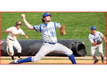 baseball pitcher in action with players in background