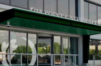 entrance with 'oak point university' sign