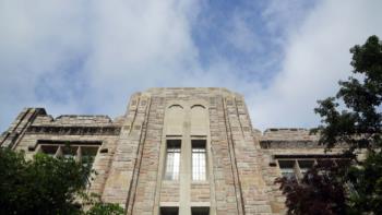 historic stone building with blue sky