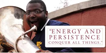 musician with tuba, quote 'energy and persistence conquer all things'