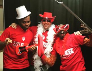 three people in costumes with IU gear