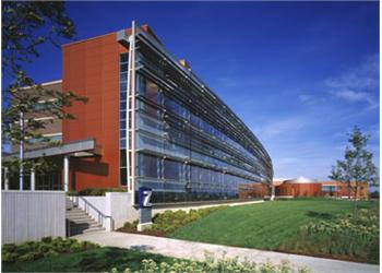 modern building with glass facade and red accents