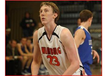 basketball player in white jersey with 'waburg 23'