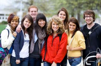 group of smiling students outdoors