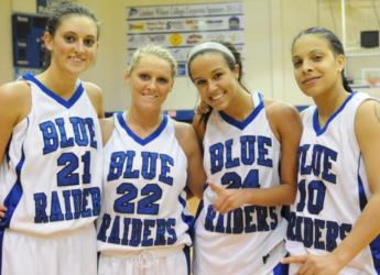 four basketball players in blue raiders uniforms