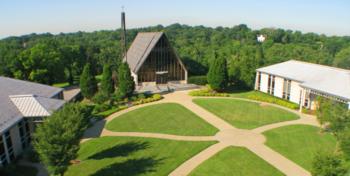 aerial view of campus buildings with a chapel