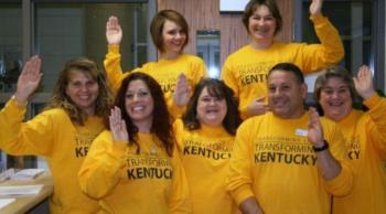 group of people in yellow shirts with 'kentucky' text