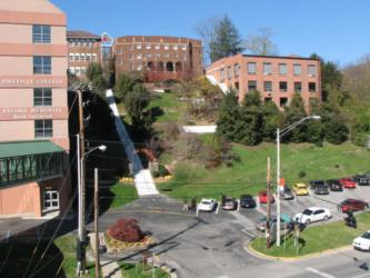 outdoor view of campus buildings and parking lot