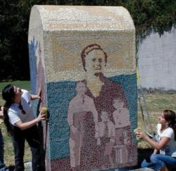 students creating a mosaic art piece