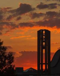 sunset behind bell tower