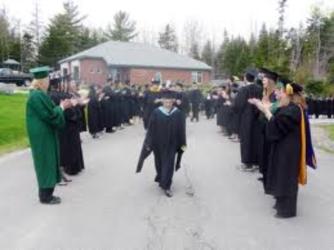 graduation procession with faculty in regalia