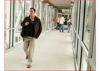 students walking through a corridor