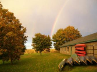 rainbows over buildings with outdoor equipment