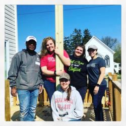 group of students volunteering outdoors