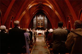 community gathered inside a church