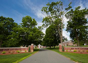 entrance sign at bay path university driveway