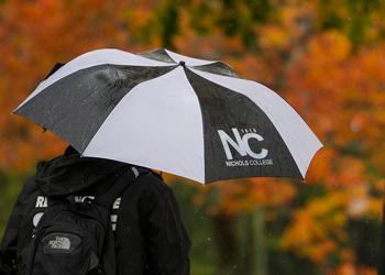 umbrella with 'Nichols College'