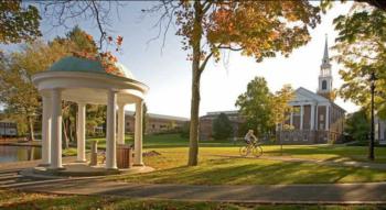 gazebo and church-like building with cyclist