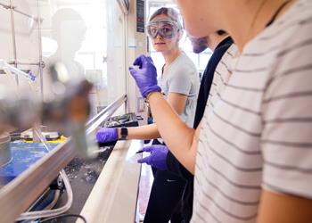 students conducting a lab experiment