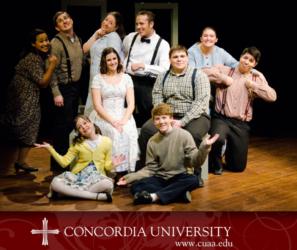 group of actors on stage with 'concordia university cuaa.edu' logo