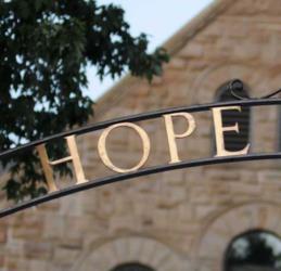 'hope' sign with building in background