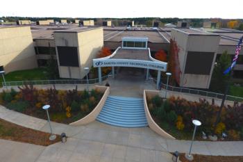 aerial view of college entrance with 'Dakota County Technical College' sign