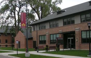 brick campus building with 'UMN Morris' banner