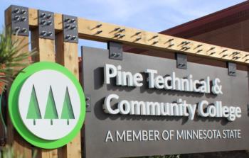 signage with 'Pine Technical & Community College - A Member of Minnesota State'
