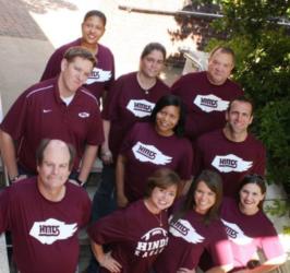 group of people in maroon shirts with 'hinds' text