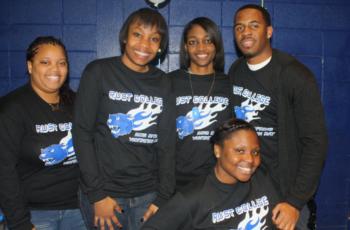 group in matching shirts with text 'just us league'