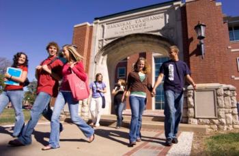 students walking in front of 'lincoln at mckendree' building