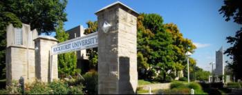 entrance arch with 'wellesley college' sign