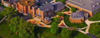 aerial view of campus with brick buildings and pathways