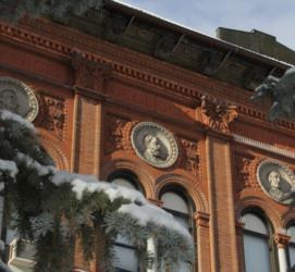 close-up of a building with intricate facade details and snow