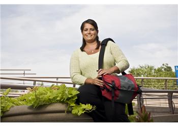 smiling student outside campus