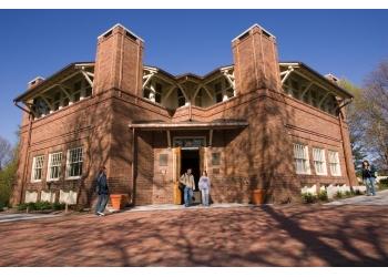 brick building with students at the entrance