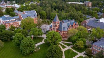 aerial view of a campus with greenery and historic buildings