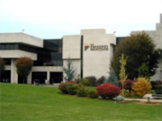 lush lawn with 'Bergen' building in the background