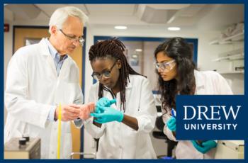 researchers in lab coats examining a substance with 'drew university' logo