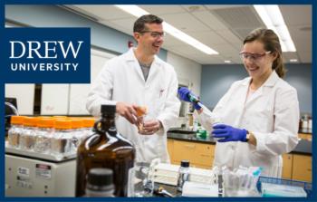 two people experimenting in a science lab with 'drew university' logo