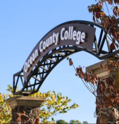 arched entrance sign reading 'Ocean County College'