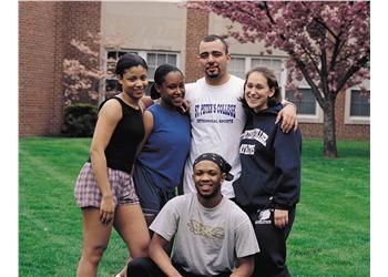 group of students smiling outdoors