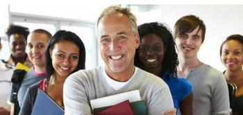 group of diverse students smiling with books