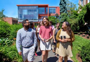 students walking on campus pathway