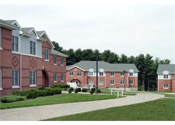 campus residential buildings with a pathway