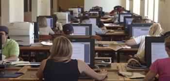 students working on computers in a computer lab