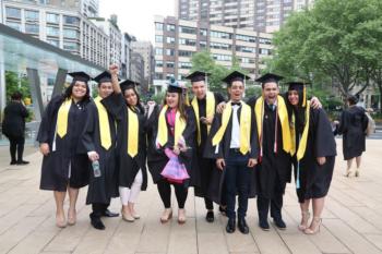 group of graduates smiling