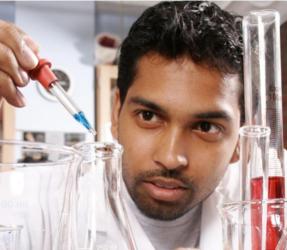 a man conducting an experiment in a lab setting