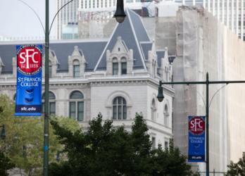 urban campus with 'st francis college' banners