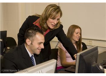 instructor and students at computers